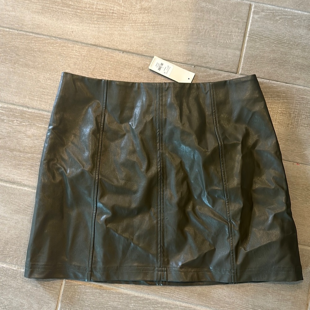 Faux leather dark green skirt! Never worn, tags still on. So cute!!!